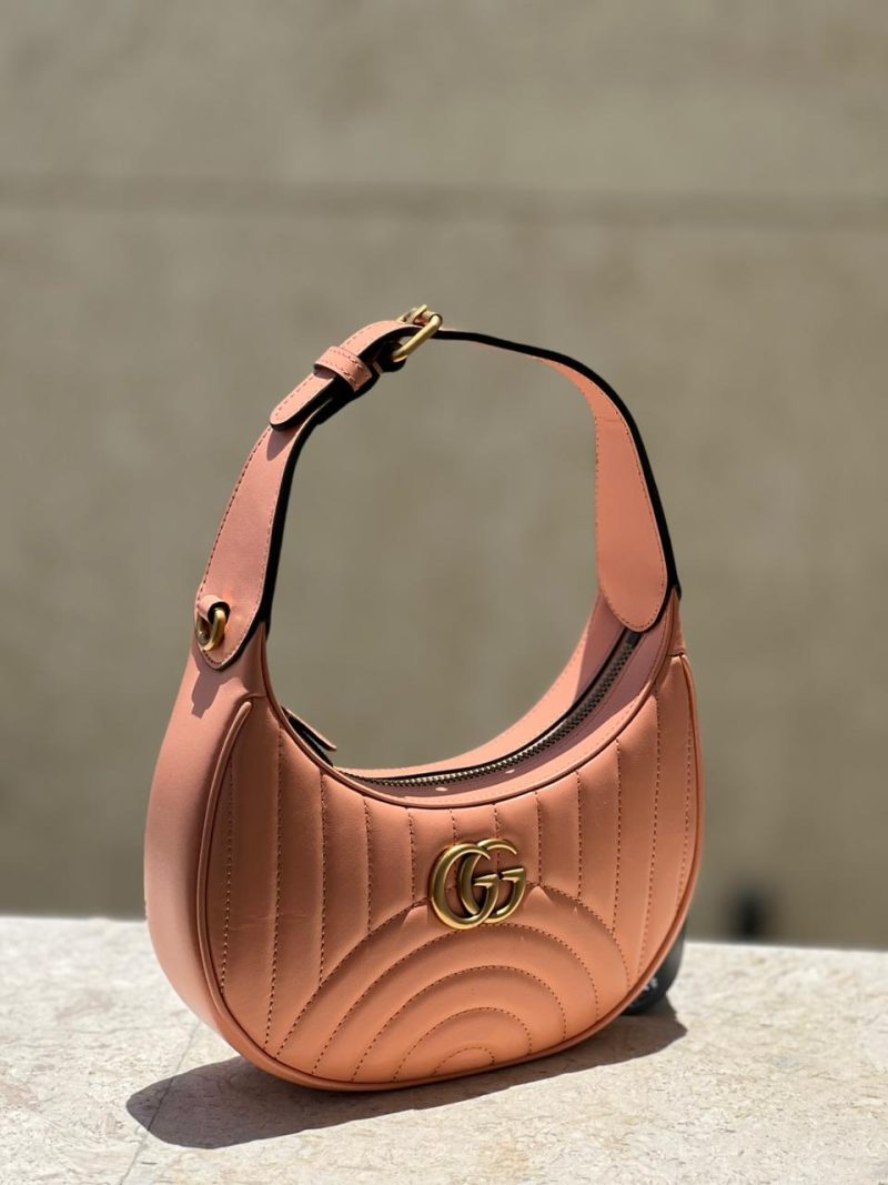 Gucci. GG. Mormont half-moon- shaped mini bag 4